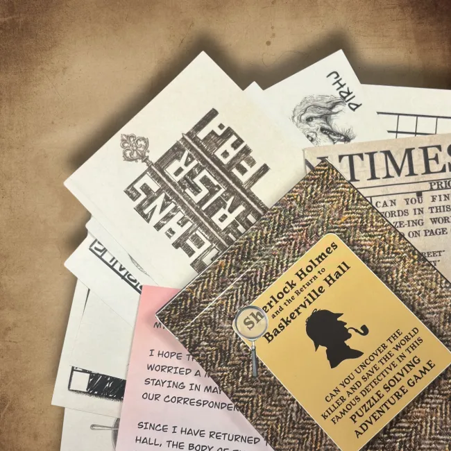 A fan of puzzle cards — a Times cutting, a mirror-written note and a handwritten letter — beside the herringbone Sherlock Holmes & the Return to Baskerville Hall box