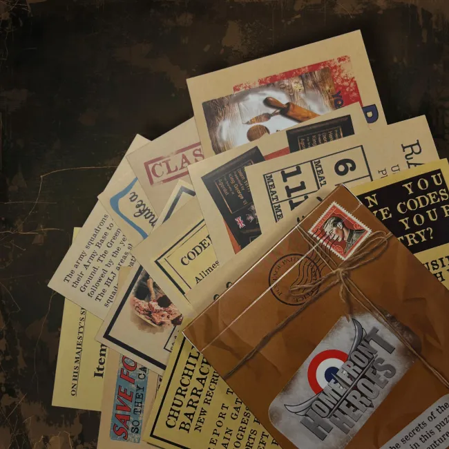 A fan of wartime puzzle cards — Churchill barracks orders, ration coupons, a classified file and coded messages — beside the string-tied Homefront Heroes envelope