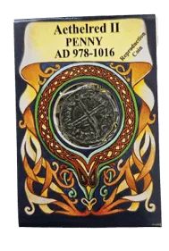 A replica Aethelred II silver penny mounted on a card of Celtic knotwork, marked AD 978-1016