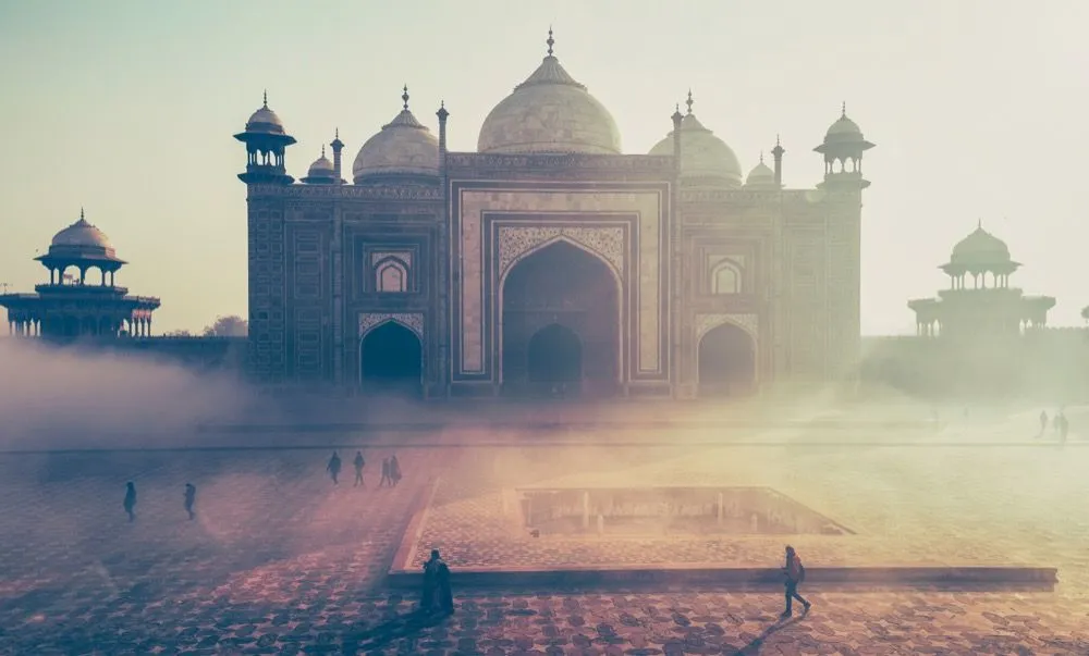 A misty view of the Taj Mahal at dusk — the Indian setting for An Inheritance of Murder